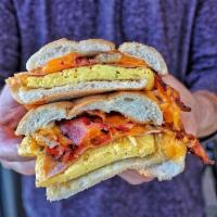 The Big Boy Sandwich · 3 scrambled eggs with Apple wood bacon, sausage, ham and cheese on a roll!