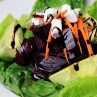 Fresh Beet and Avocado Salad · Marinated beets with fresh sliced avocado and goat chesse.