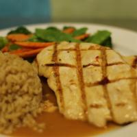 Grilled Peanut Chicken · Chicken breast marinated with spices, grilled and topped with Thai traditional peanut sauce....