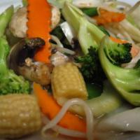 Mix Vegetable Delight · Sauteed broccoli, snow peas, bamboo shoots, water chestnuts, carrots, celery, baby corn, bea...