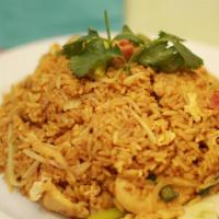 Yellow Curry Fried Rice · Stir fried rice with yellow curry, tossed with egg, tomatoes and green onions.