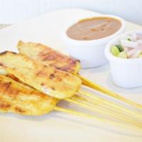 6 Chicken Satay · Grilled marinated sliced of chicken 6 pieces served with peanut sauce and cucumber salad.
