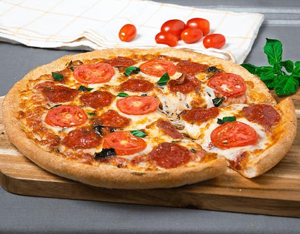 Margarita Pepperoni · Sarpino's traditional pan pizza baked to perfection and topped with freshly sliced pepperoni, ripe tomatoes, our signature gourmet cheese blend and sprinkled with fresh basil.