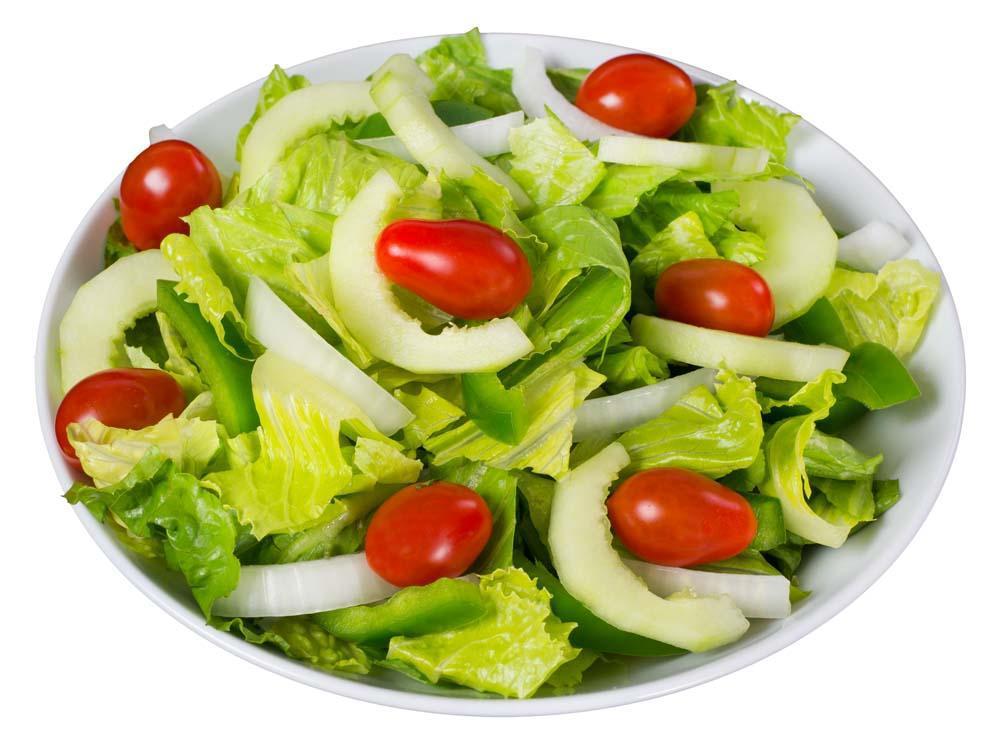 Green Salad · Grape tomatoes, onions, green peppers and cucumbers on the bed of crisp lettuce.