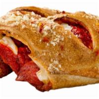 Pepperoni Calzone · Freshly sliced pepperoni and our signature gourmet cheese blend smothered in homemade tomato...