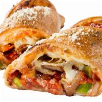 Sausage Calzone · Spicy Italian sausage, tender green peppers and onions, our signature gourmet cheese blend, ...