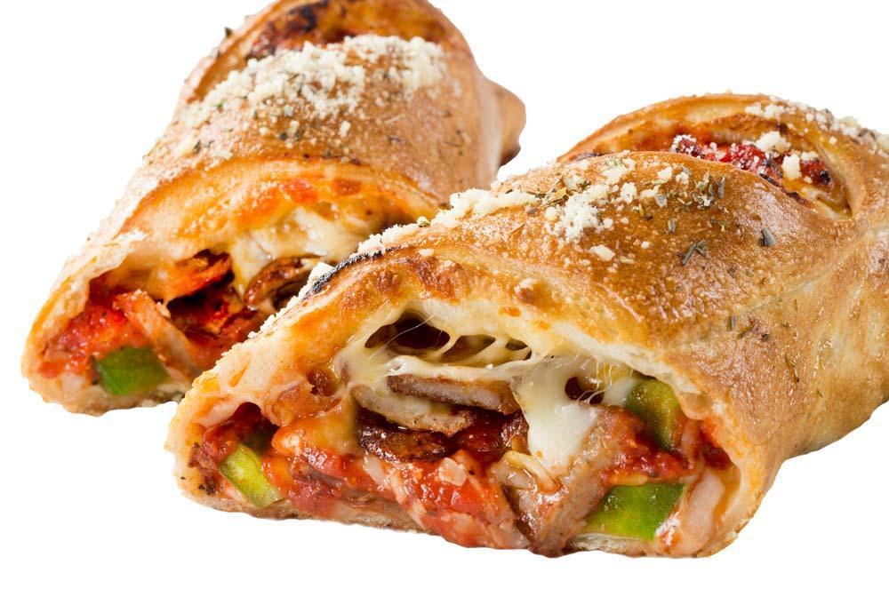 Sausage Calzone · Spicy Italian sausage, tender green peppers and onions, our signature gourmet cheese blend and homemade tomato sauce wrapped in a golden-brown crust, brushed with rich garlic butter and sprinkled Parmesan cheese.
