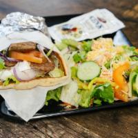 Gyro (Combo) · Choice of Lamb, Chicken, or Beef with Lettuce, Onions, Tomatoes, and Tzatziki sauce with a S...