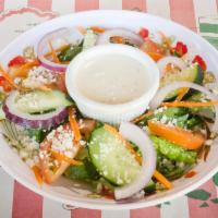 House Salad · Mixed romaine and iceberg lettuce, tomatoes, cucumbers, onions, carrots and peppers.