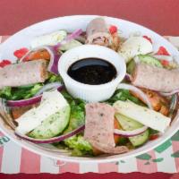 Antipasto Salad · Mixed romaine and iceberg lettuce, mozzarella cheese, pepperoni, salami, ham, tomatoes and c...