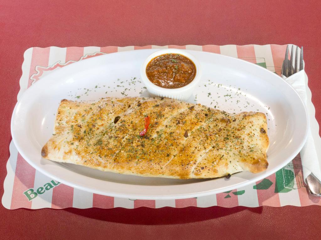 Stromboli Meat Lover · Ham, pepperoni, sausage and ground beef.