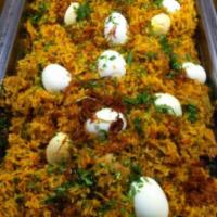 Chicken Biryani · Biryani is flavored rice steamed with spices and the meat or vegetables.