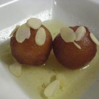 Gulab Jamun · Milk and cheese balls in honey syrup.
