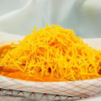 20. Three Piece Rolled Taco Filled with Meat · Served over a lite blend tomato sauce and topped with cheddar cheese.