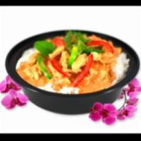 Panang Red Curry · Panang curry paste, rich coconut milk, peanut sauce, carrots, green peas and bell pepper. Sp...