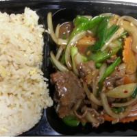 Pepper Steak · Fresh beef flank stir-fried with pepper sauce, tomato, bell pepper, onions and carrot.