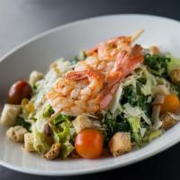 Shrimp Kale Caesar Salad · Romaine, roasted Brussels sprouts, pistachios, raisins, baby tomatoes, parmesan.