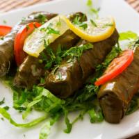 Stuffed Grape Leaves (Yaprak Sarma) · Home made grape leaves stuffed with rice and vegetables prepared with olive oil.