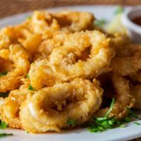 Fried Calamari · Crispy fried calamari served with marinara sauce. Contains gluten and dairy.