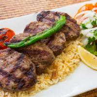 Dinner Lamb Kofte Kebab · Ground lamb blended with eggs, onions, garlic, parsley and spices. Lamb kofte contains glute...