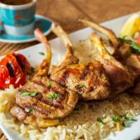 Dinner Lamb Chops (Pirzola) · Lamb chops charcoal broiled to perfection. Served with rice, grilled pepper and tomato, and ...