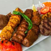 Dinner Mixed Grill · 1 Skewer each of lamb adana kebab, lamb shish kebab, lamb and chicken kofte, lamb gyro kebab...