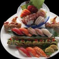 Sushi and Sashimi for 2 · Raw. 18 pieces sashimi, 8 pieces sushi, 1 dragon roll and 1 ten special roll.