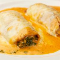 Crespelle Fiorentina · Eggplant cannelloni filled with ricotta and spinach.