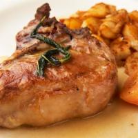 Nodino Alla Salvia · Broiled veal chop with fresh sage.