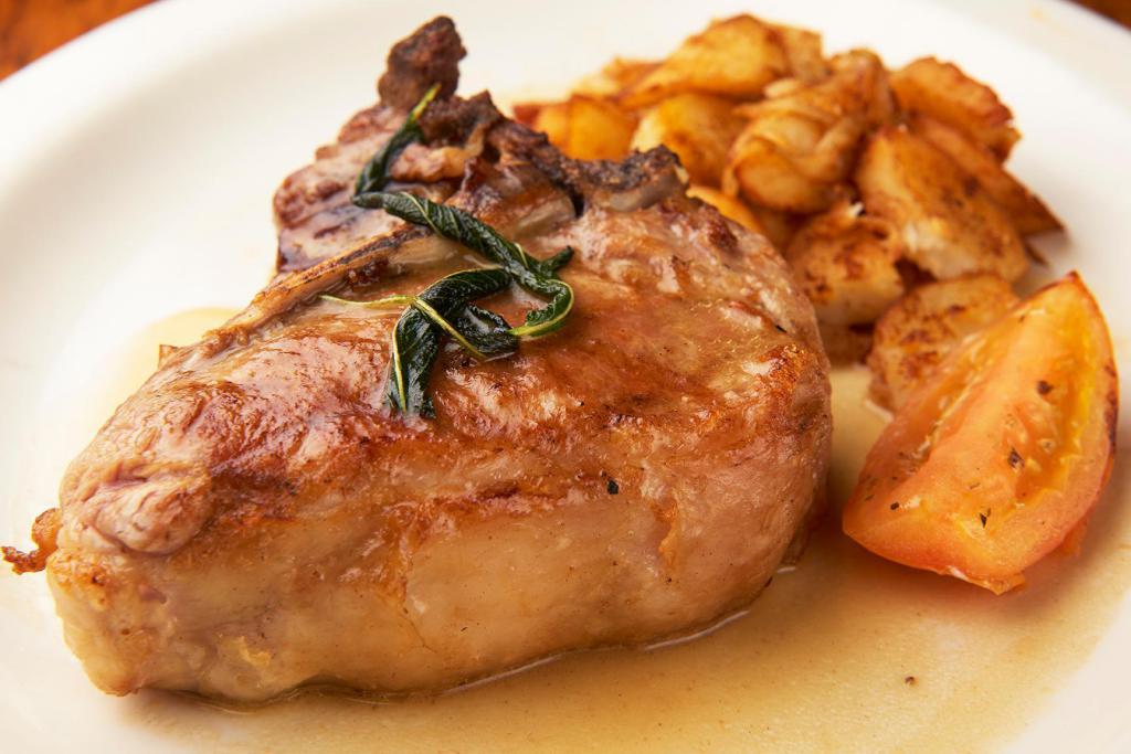 Nodino Alla Salvia · Broiled veal chop with fresh sage.