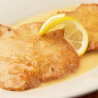 Vitello Martini · Veal encrusted with Parmesan sauteed in lemon and white wine.