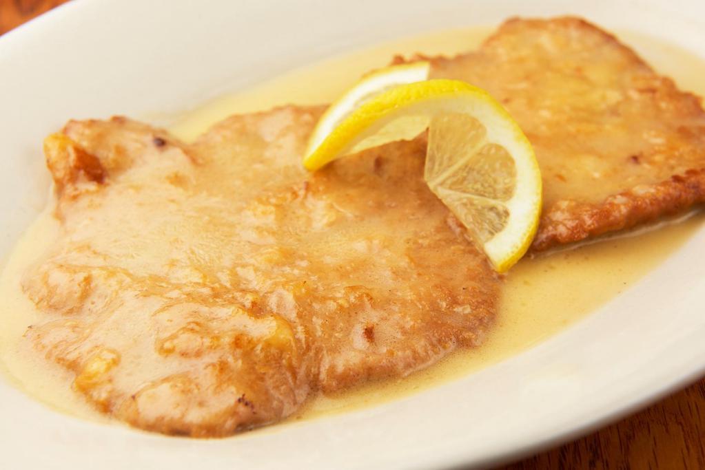 Vitello Martini · Veal encrusted with Parmesan sauteed in lemon and white wine.