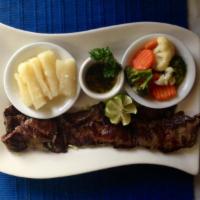 Churrasco · Churrasco steak. Served with 1 tortilla or bread and choice of 2 sides.