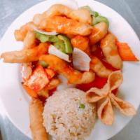 C2. Sweet and Sour Chicken · Chicken white meat battered and fried with carrots, bell peppers and onions topped with swee...
