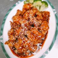 C20. Sesame Chicken · Chicken dark meat battered, fried, sauteed with in our sweet and spicy sesame sauce garnishe...
