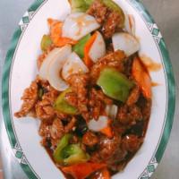 B4. Pepper Steak · Beef stir fried with bell peppers, carrots and onions in a brown sauce.