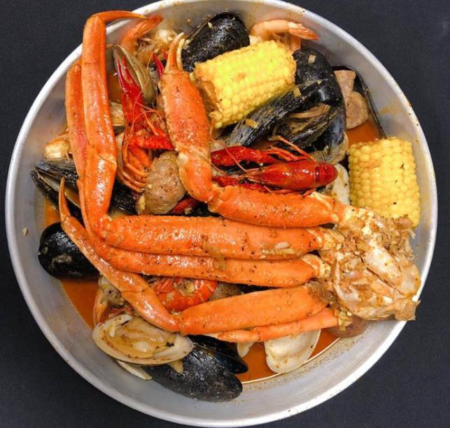 Captain's Catch · 1 lb. of clams, 1 lb. of mussels, ½ lb. of crawfish, ½ lb. of shrimp, ½ lb. of snow crab legs, ¼ lb. of andouille sausage, 2 pieces of corn, and 2 pieces of potatoes.