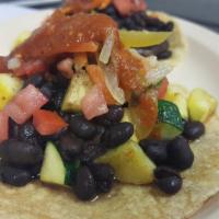 Veggie Taco · Corn tortilla, beans, salsa fresca, zucchini and yellow squash. Vegetarian.