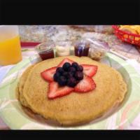 Gluten Free Pancakes · Voted Top 25 places to eat pancakes in America by Travel and Leisure!!  Topped with blueberr...