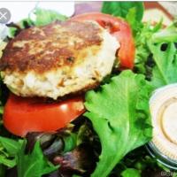 Crab Cake Passion · Voted best in New Orleans. Lump crabmeat served with fresh spring mix greens, ripe tomatoes ...