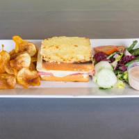 Croque Monsieur Lunch · Bechamel, Swiss and ham on brioche topped with sunny side up egg