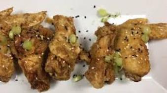 Crispy Korean Wings · Jumbo Korean style wings in soy garlic, sweet spicy chili, Buffalo, or naked (1 sauce per or...