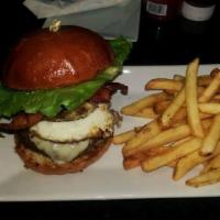 Aussie Burger · Grilled pineapple, BLT, fried egg, pepper jack, mayo. Served with fries.