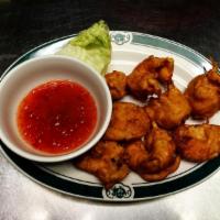 A6. Tôm Chiên Bột · Deep-fried shrimp served with sweet and sour sauce.