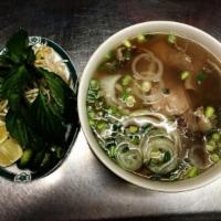 C1. Phở Đặc Biệt · Dalat special combination beef noodle soup (top round steak, flank, lean brisket, tendon, tr...