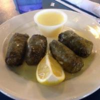 4 Pieces Meat Dolmas · Stuffed grape leaves with a meat or rice mixture and lemon sauce.