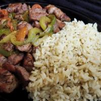 Pork Skillet (Fajita style) · Fajita style. Served with sauteed onions, green peppers and tomatoes . Served with rice or f...