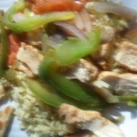 Chicken Skillet (Fajita style) · Fajita style. Served with sauteed onions, green peppers tomatoes and  served with rice or fr...