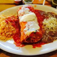 11. Burrito Ranchero Combo · Chicken or al pastor topped with delicious salsa, melted Monterey Jack cheese and sour cream.