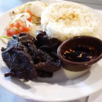Tapsilog · Marinated cured beef. Served with coffee and garlic fried rice. Coffee will not be included ...